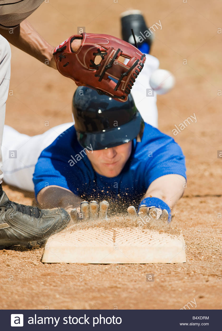 baseball-player-sliding-into-home-base-B4XDRM.jpg