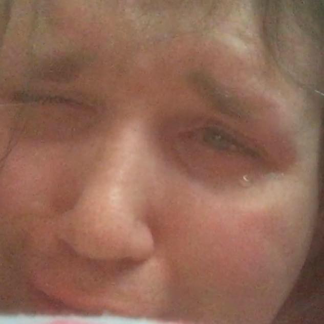 Chris_crying_over_Quinn.jpg