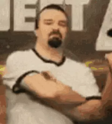 lowqualityphilcrossinghisarms.webp