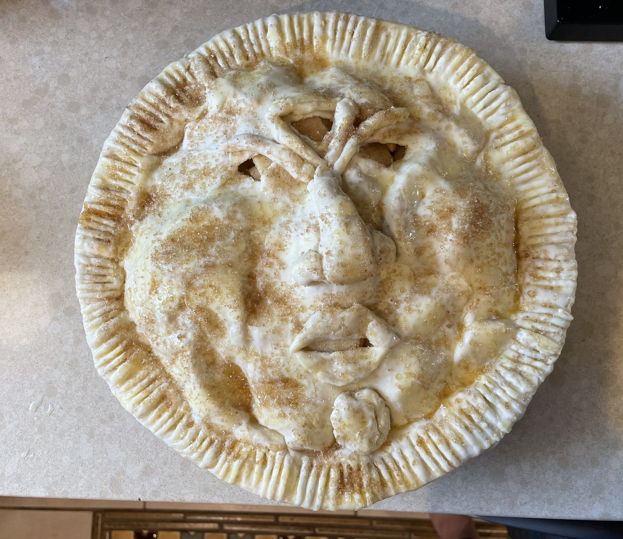 making an apple pie that looks like Dagoth Ur from Morrowind, check back in like ~75min to see...jpg
