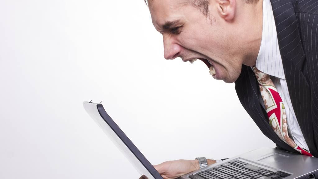 man-yelling-at-computer.jpg
