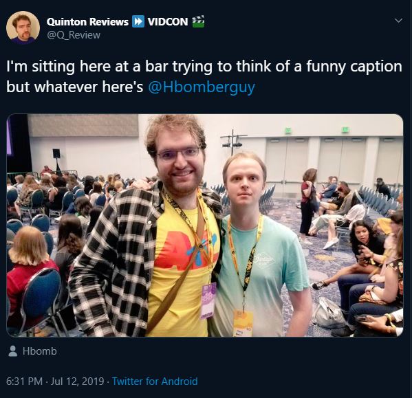 quinton with a balding alien man.jpg
