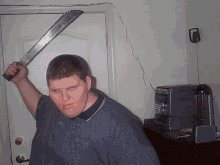 fat-guy-with-machete-kill-with-sight.gif